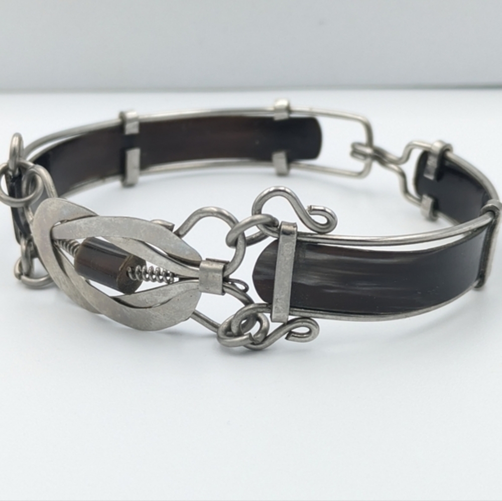 Metal and horn silver tone bracelet